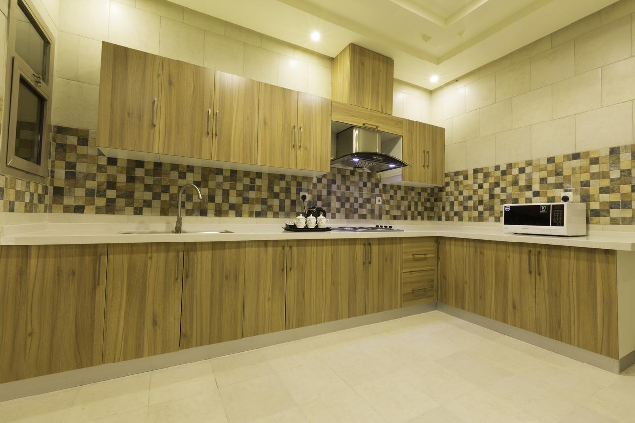 Ayam Lilian Aparthotel Бурайда Экстерьер фото
